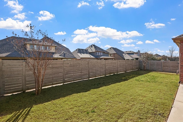 view of yard featuring a fenced backyard