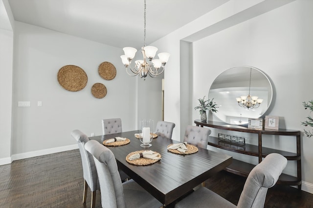 dining space featuring baseboards and a notable chandelier