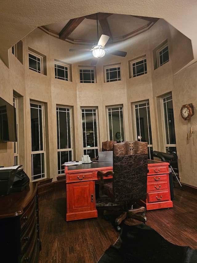 office featuring dark wood-style floors, beamed ceiling, and ceiling fan