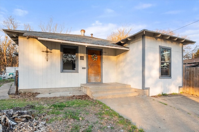 view of front of house with fence