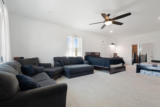 carpeted living room featuring recessed lighting, ceiling fan, and crown molding