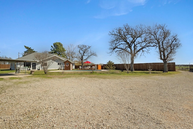 view of yard featuring fence