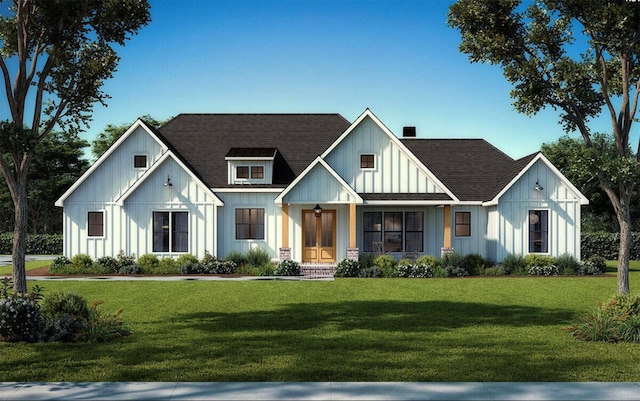 modern farmhouse with a front yard, board and batten siding, and a shingled roof