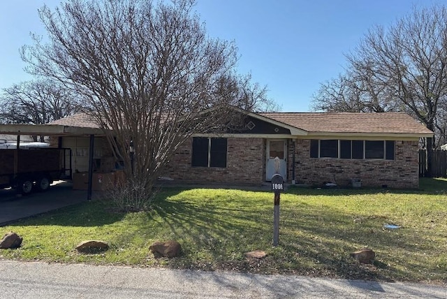 single story home with brick siding, crawl space, and a front yard