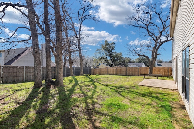 view of yard with a fenced backyard