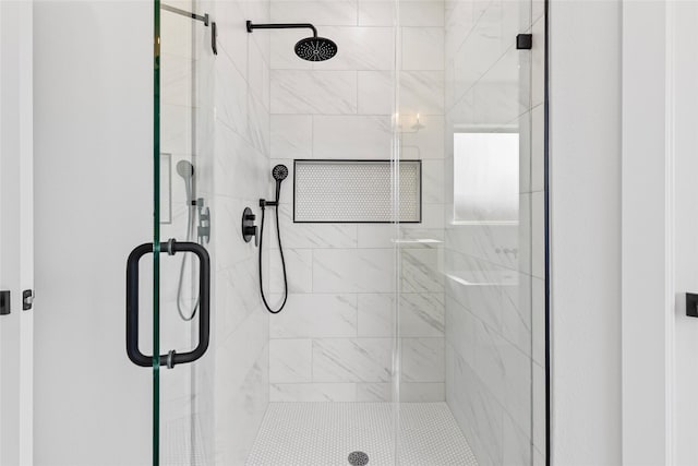 bathroom featuring a stall shower