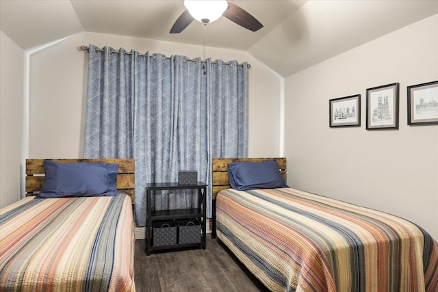 bedroom featuring ceiling fan, lofted ceiling, and wood finished floors