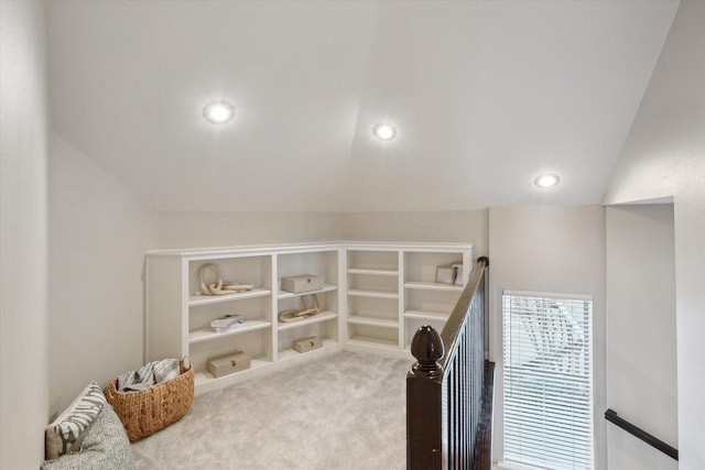 interior space featuring carpet flooring, recessed lighting, and lofted ceiling