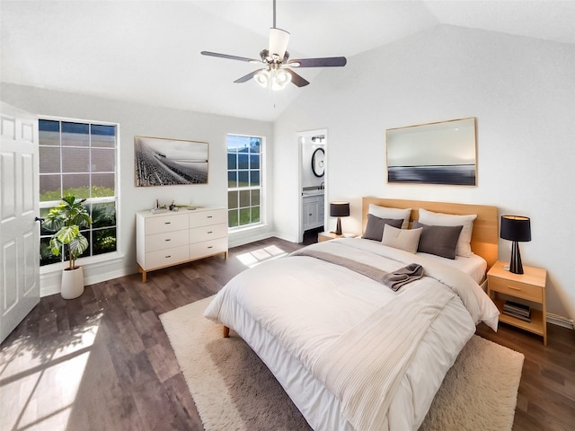 bedroom with ceiling fan, baseboards, lofted ceiling, and wood finished floors