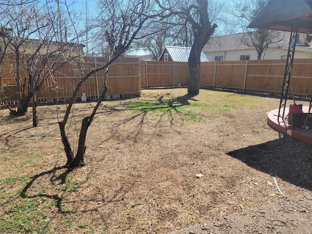 view of yard featuring a fenced backyard