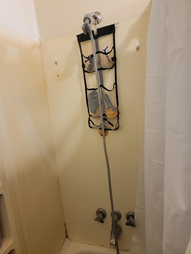 details with shower / bath combo