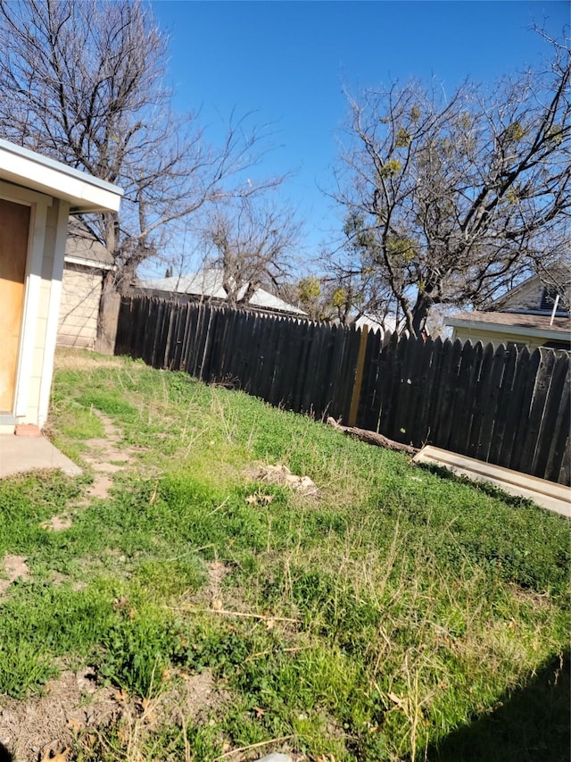 view of yard with fence