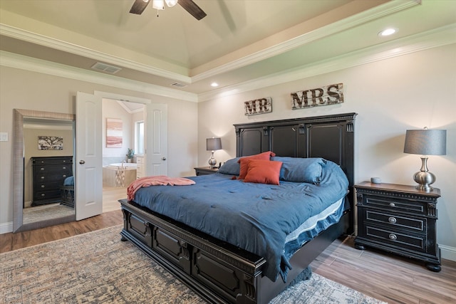 bedroom featuring recessed lighting, visible vents, ornamental molding, and wood finished floors