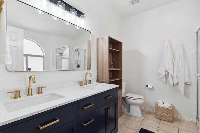 bathroom with a sink, visible vents, toilet, and a shower stall