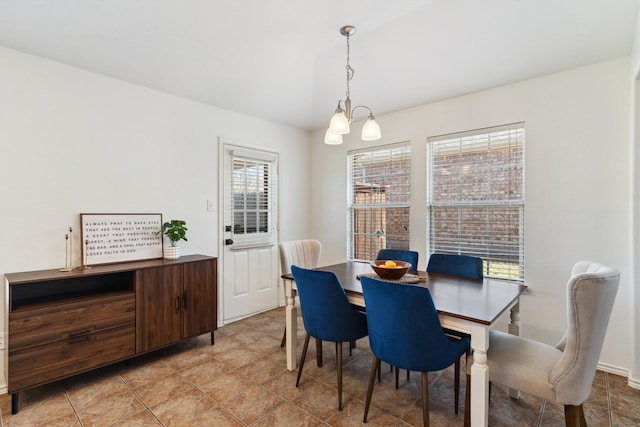 dining area with a chandelier