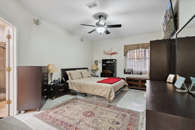 tiled bedroom featuring visible vents and a ceiling fan