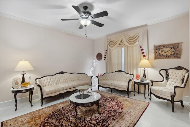 living room featuring ceiling fan, baseboards, and ornamental molding