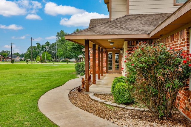 view of yard featuring french doors