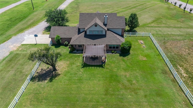 birds eye view of property featuring a rural view