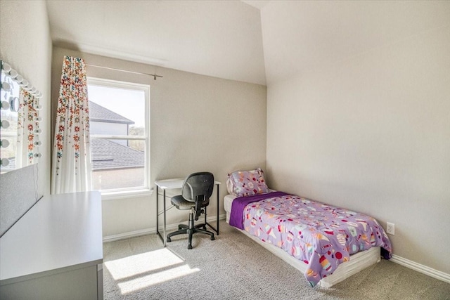 bedroom with baseboards and carpet flooring