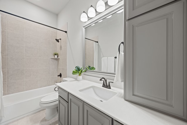 full bathroom with vanity, tile patterned floors, shower / tub combo, and toilet