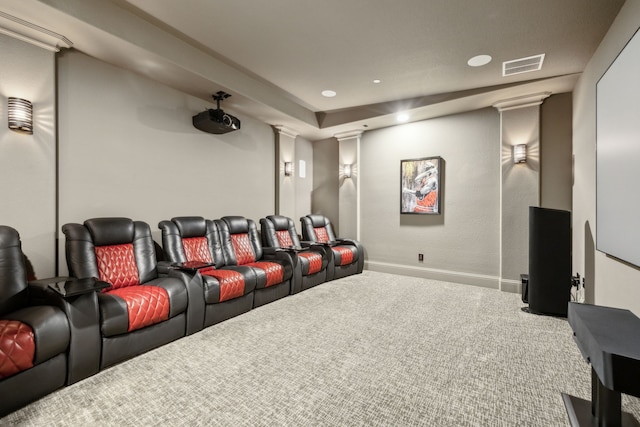 carpeted home theater room with visible vents, recessed lighting, baseboards, and decorative columns