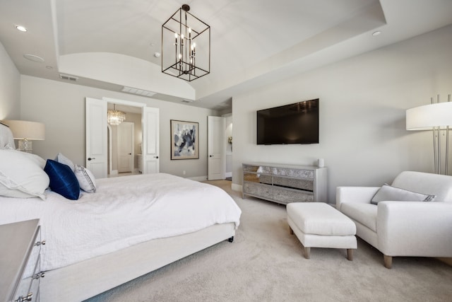 bedroom with recessed lighting, visible vents, light carpet, and a raised ceiling