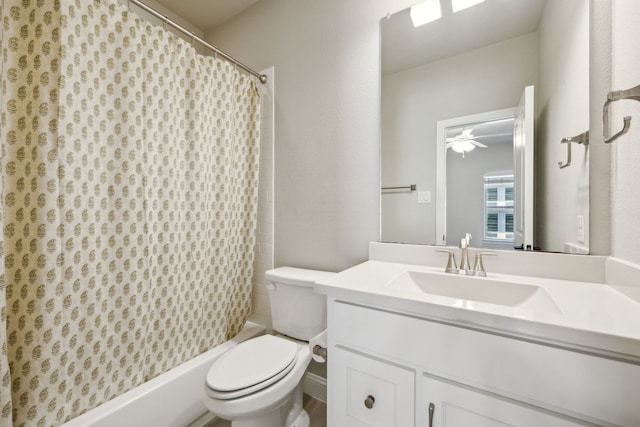 full bath featuring shower / bathtub combination with curtain, toilet, ceiling fan, and vanity