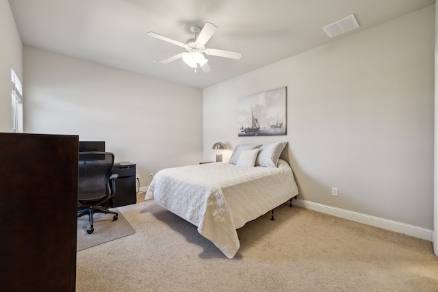 bedroom featuring baseboards, visible vents, carpet floors, and ceiling fan