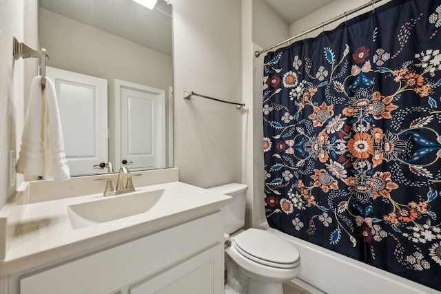 full bathroom featuring vanity, toilet, and shower / bathtub combination with curtain