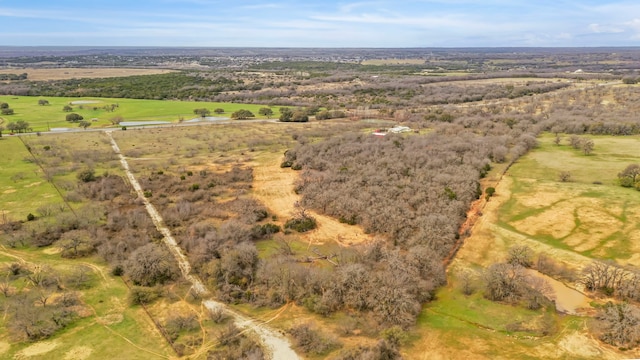 birds eye view of property featuring a rural view