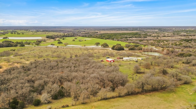 birds eye view of property with a rural view