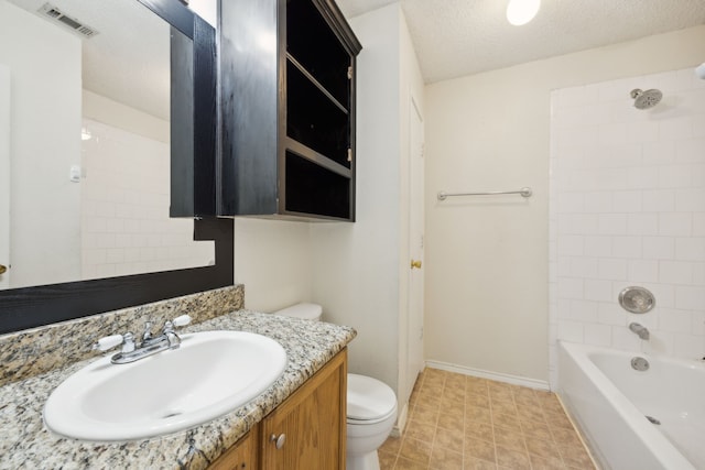 full bath with visible vents, tub / shower combination, toilet, vanity, and a textured ceiling