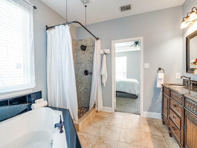 ensuite bathroom featuring visible vents, tile patterned floors, tiled shower, a bath, and vanity