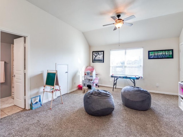 rec room featuring vaulted ceiling, a ceiling fan, baseboards, and carpet floors