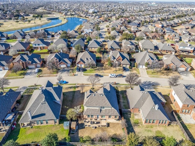 birds eye view of property with a residential view