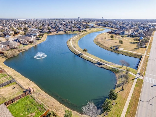 aerial view featuring a residential view and a water view