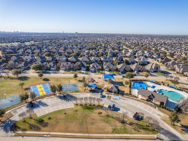 birds eye view of property with a residential view