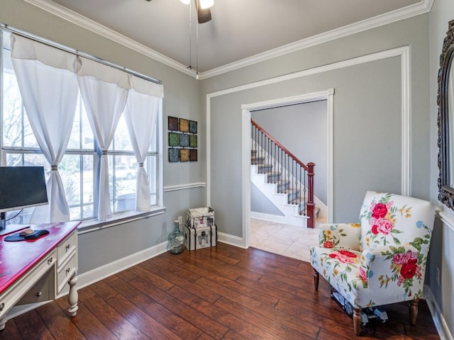 living area with hardwood / wood-style floors, stairway, baseboards, and ornamental molding