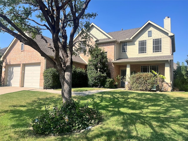 2453 Dawn Mist Dr, Little Elm, TX 75068 - traditional home featuring brick siding, concrete driveway, a garage, a front lawn, and a chimney