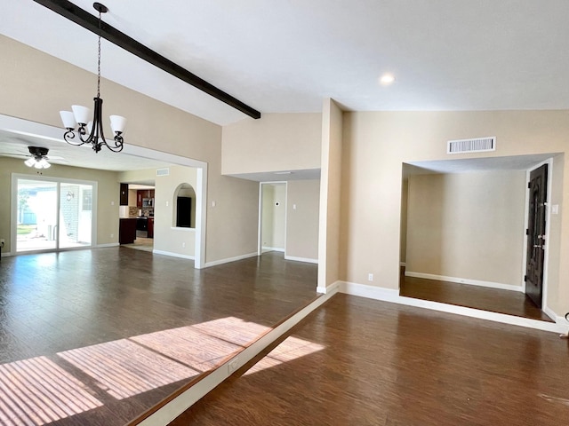 unfurnished living room with visible vents, ceiling fan with notable chandelier, lofted ceiling with beams, wood finished floors, and baseboards