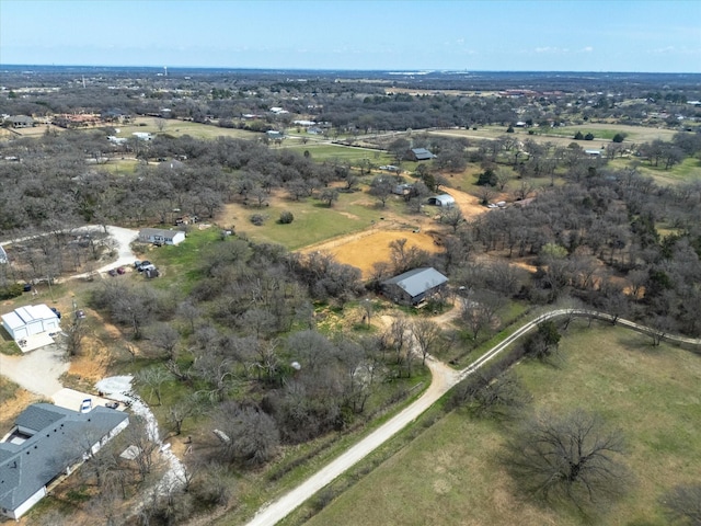 birds eye view of property featuring a rural view