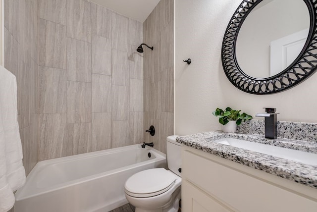 bathroom with vanity, shower / tub combination, and toilet