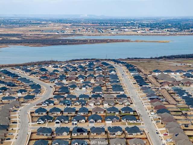 aerial view with a residential view and a water view