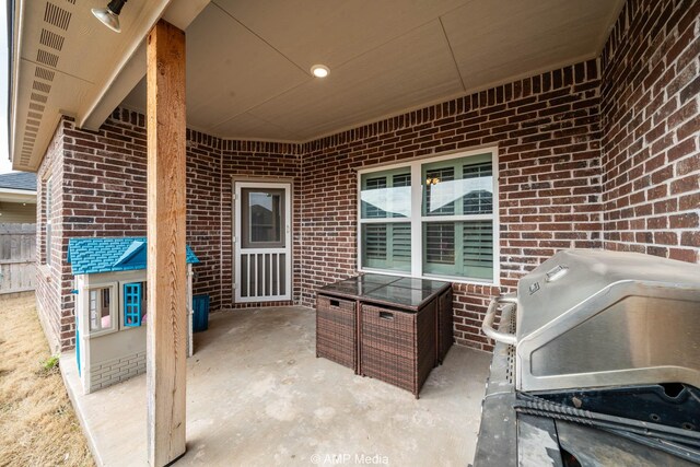 view of patio featuring grilling area