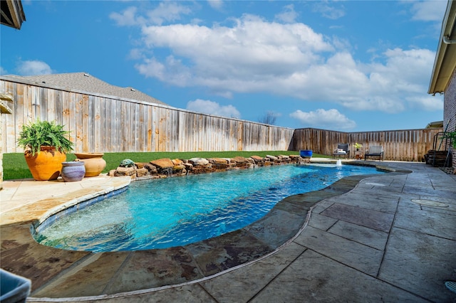 view of pool with a fenced in pool, a patio, and a fenced backyard