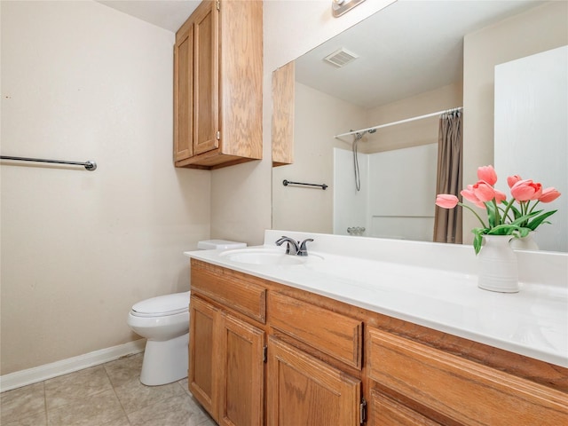 bathroom featuring visible vents, toilet, tile patterned flooring, baseboards, and vanity