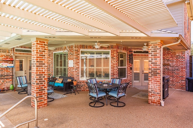 view of patio featuring a ceiling fan and a pergola