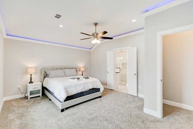 bedroom featuring baseboards, visible vents, crown molding, carpet flooring, and connected bathroom