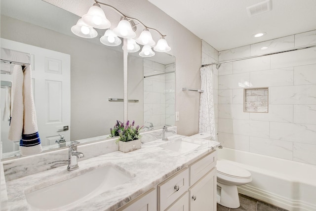 full bath featuring visible vents, shower / bath combination with curtain, toilet, and a sink